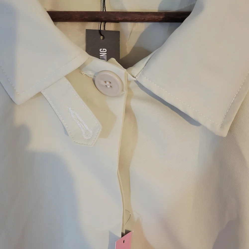 PrettyLittleThings Plus Cream Cropped Jacket